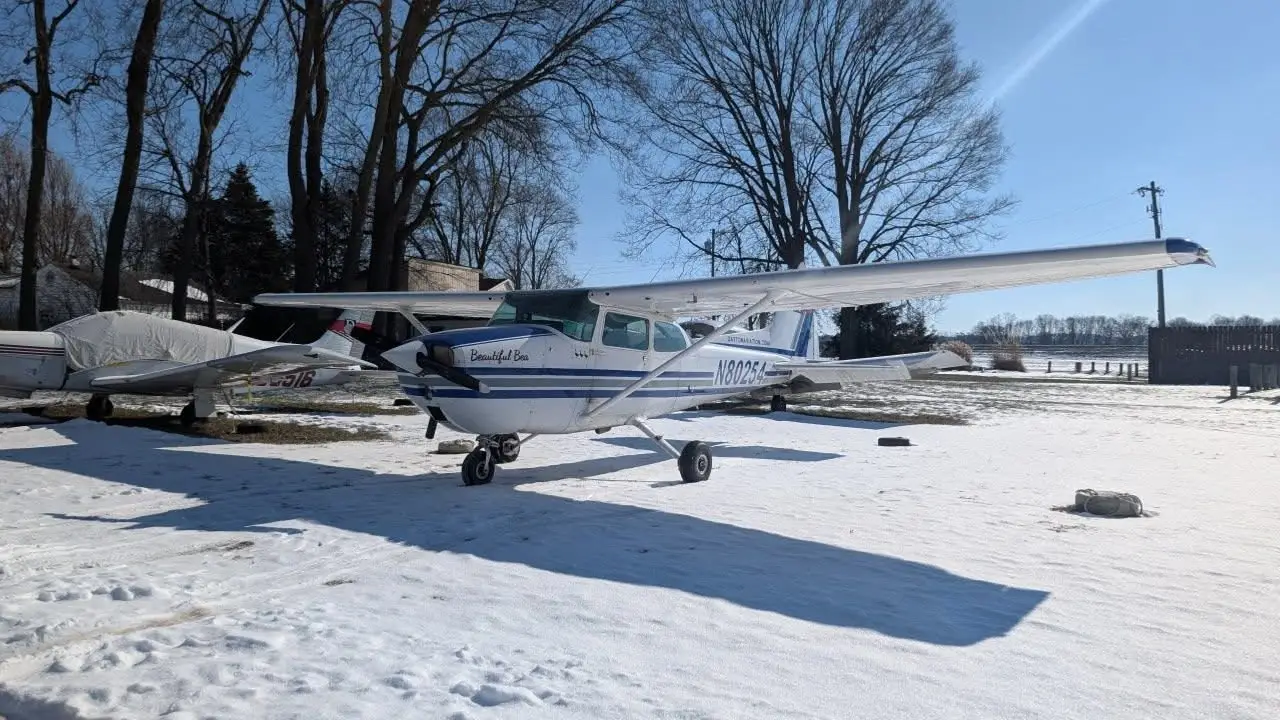 Cessna 172M N80254 Beautiful Bea front view on snow