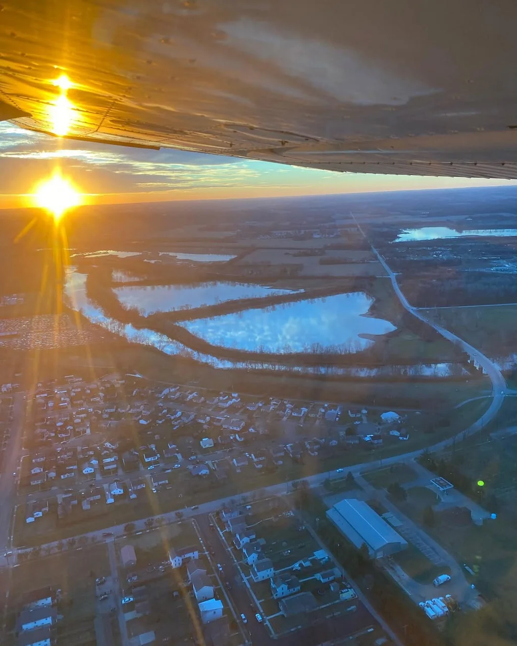 Aerial view of the Great Miami River and Dayton from a training airplane